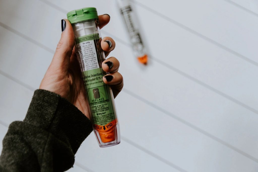Anaphylaxis, person holding Epinephrine Auto-Injector