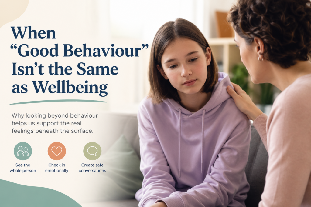 Adult supporting a young person during an emotional wellbeing conversation, highlighting the importance of looking beyond behaviour to understand feelings, mental health and wellbeing.